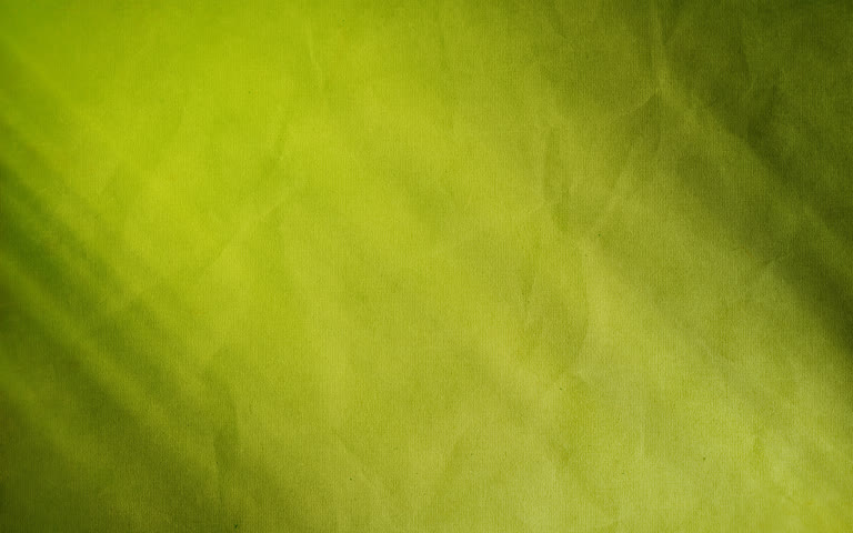 有一张绿墙和时钟的特写图