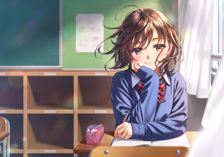 有一个女孩坐在书桌前,拿着一本书