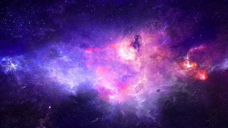 这是一张带有星星的紫色和蓝色星系的图像