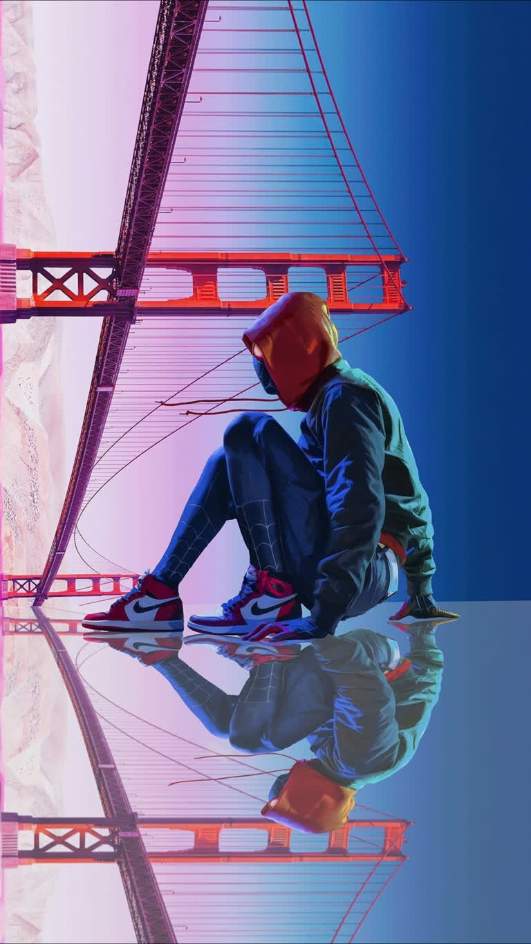 有一个男人拿着滑板坐在地上