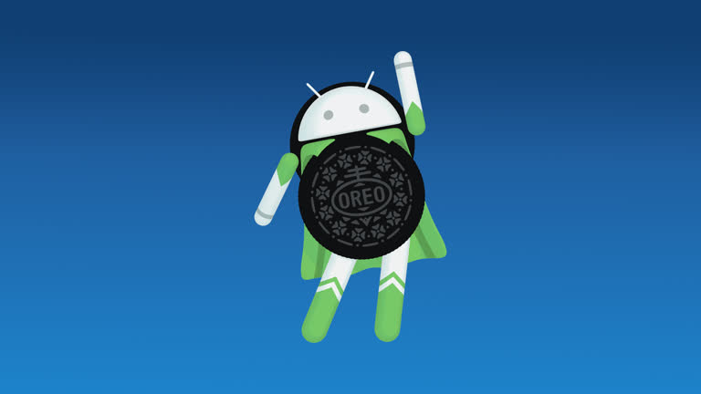 Android Oreo 角色拿着 Oreo 饼干的图像