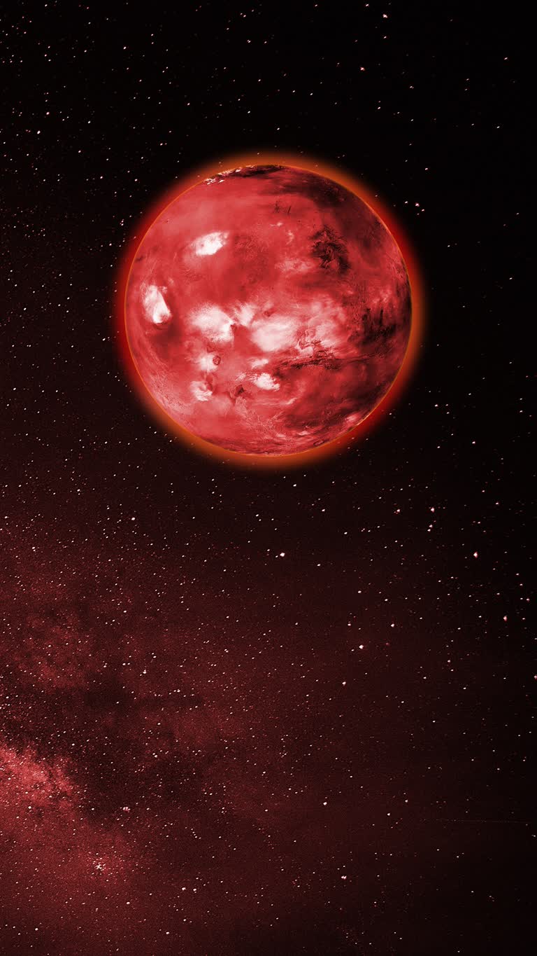天空中有一个红色物体,背景是星星