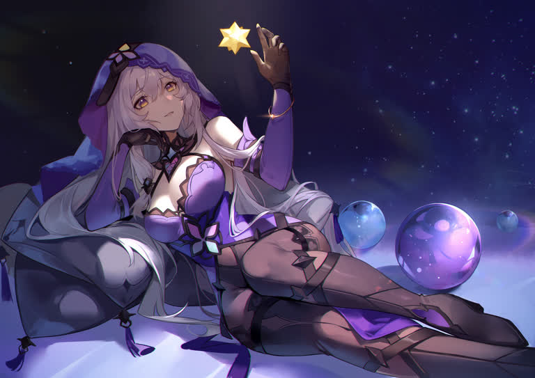 有一个女人坐在地上,手里拿着一颗星星